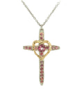 Taru Jewelry Cross and Heart Necklace crafted from 18K gold and silver is a unique blend of traditional and modern design. The cross, a timeless symbol of faith and devotion, is adorned with beautiful pink topaz, adding a touch of color and elegance to the piece.