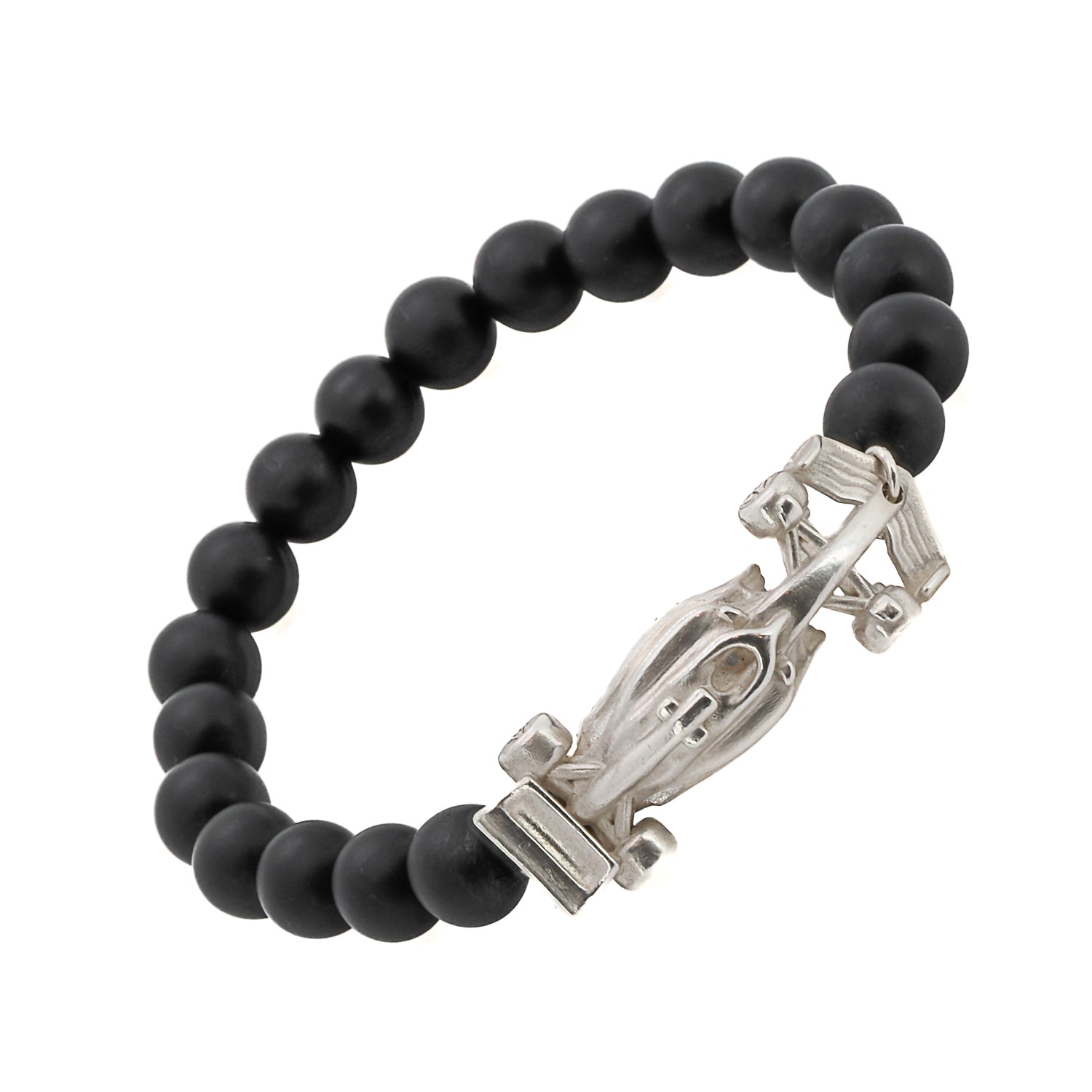 The Race Car Black Onyx Bracelet is a stylish and sleek piece of jewelry that is perfect for those who love cars or racing. It is made from black onyx beads and features a small silver race car charm. The bracelet is stretchy and comfortable to wear, and can fit most wrist sizes. The black onyx beads are said to have protective energy and are believed to help with stress and anxiety. This bracelet is a great accessory for any car enthusiast or anyone who loves unique and trendy jewelry.