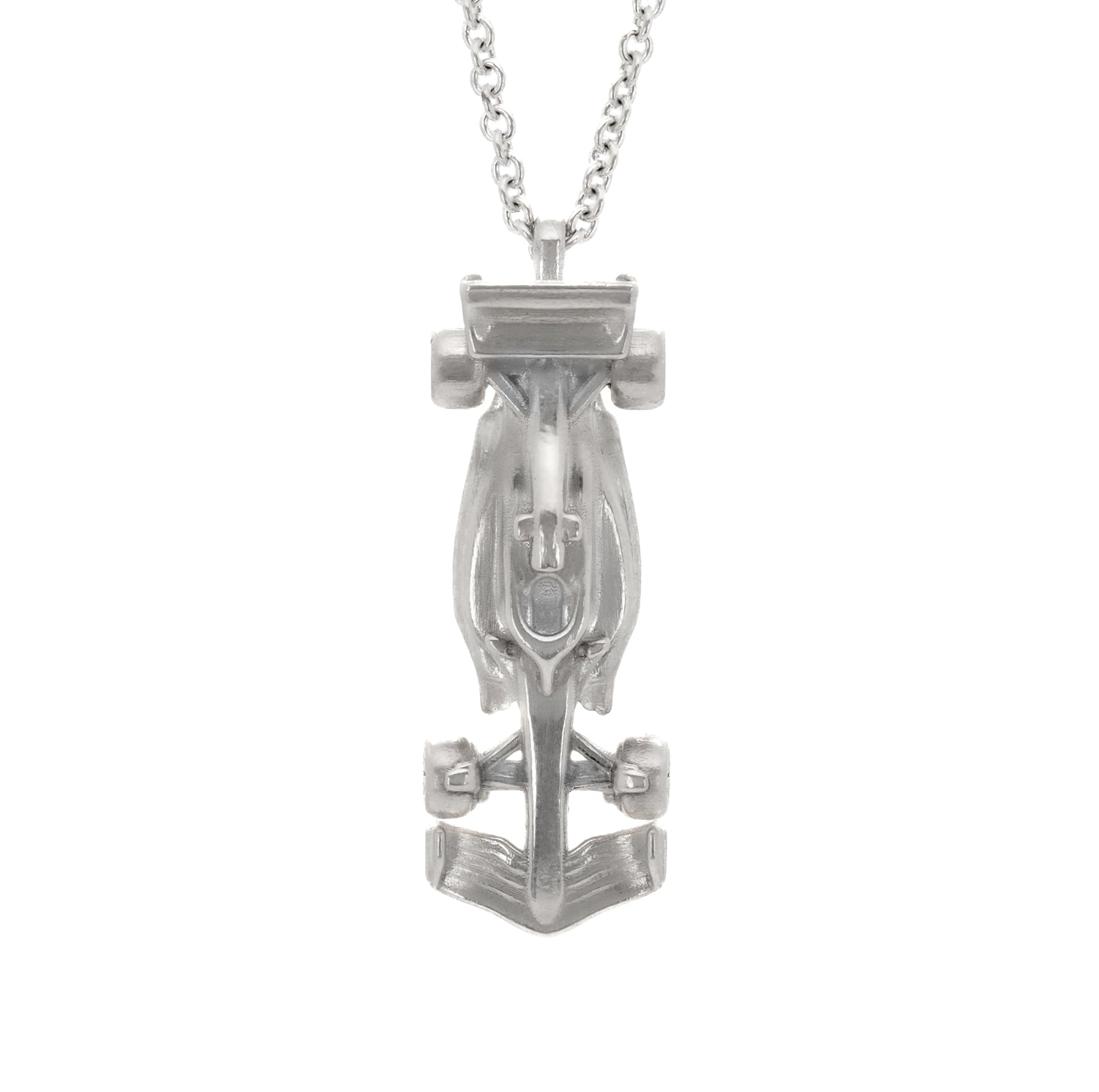 The Race Car Necklace is a stunning piece that captures the essence of speed and adrenaline. Crafted from sterling silver, this necklace features a sleek and aerodynamic race car design complete with intricate details. The streamlined body of the car creates a sense of movement and energy. The wheels of the car are finely detailed and perfectly balanced, ready to take on any race course.