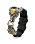 Taru Jewelry Bull Bracelet is a stunning piece that exudes strength and power. Crafted from 18K yellow gold and silver with black and brown diamonds, it features the symbol of a bull prominently displayed on the front.