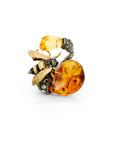 Taru Jewelry Bee Ring made of 18K yellow gold and sterling silver is centered with a gorgeous amber stone that mimics the hue of honey, upon which the bee rests.
