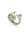 Taru Jewelry Dolphin Ring in 18K gold and sterling silver is decorated with champagne and blue diamonds. The fins are finely set with marquise cut emeralds.