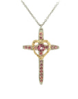Taru Jewelry Cross and Heart Necklace crafted from 18K gold and silver is a unique blend of traditional and modern design. The cross, a timeless symbol of faith and devotion, is adorned with beautiful pink topaz, adding a touch of color and elegance to the piece. 