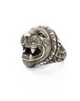 Taru Jewelry stunning lion ring is crafted from sterling silver and adorned with sparkling brown and black diamonds. The intricate details of the lion's face are hand-engraved, capturing the texture of its fur and the fierce expression of its eyes.